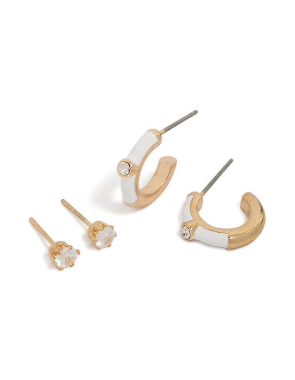 Featuring a set of hoop and diamante stud earrings in enamel with gold and white accents front view