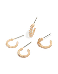 Showcasing gold simple diamante huggie earrings in a 2-pack with huggie closure front view - link has visual effect only