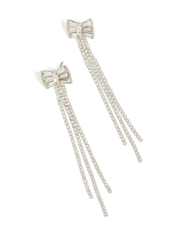 Showcasing bow tassel drop earrings featuring diamante cupchain strands in silver front view