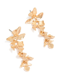 Showcasing statement drop earrings with textured flower petals in gold front view - link has visual effect only