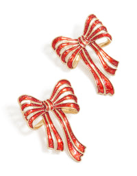 Showcasing oversized statement earrings with bow design featuring glitter striped pattern in red, white, and gold front view - link has visual effect only
