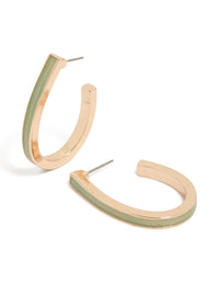 Striking gold hoop earrings featuring green enamel in an oval shape with statement styling front view - link has visual effect only
