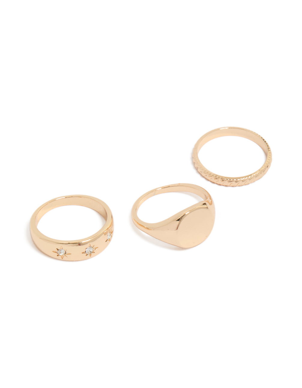 Showcasing celestial star signet rings in gold with a 3-pack set front view