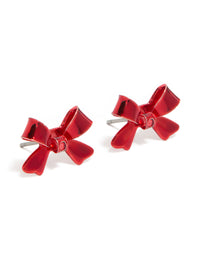 Featuring shiny red acrylic bow stud earrings in a glossy finish front view - link has visual effect only