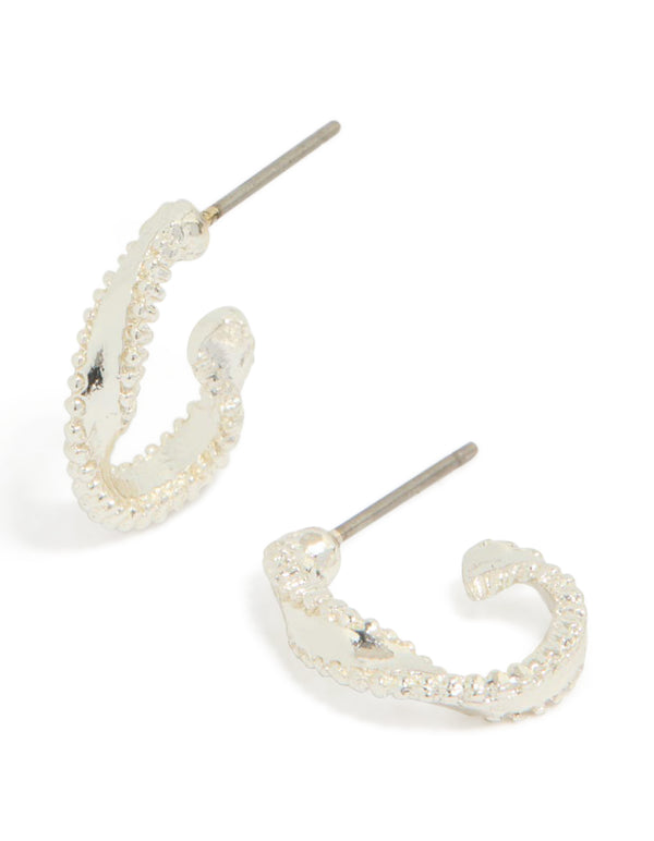 Chic mini twisted hoop earrings crafted in silver front view