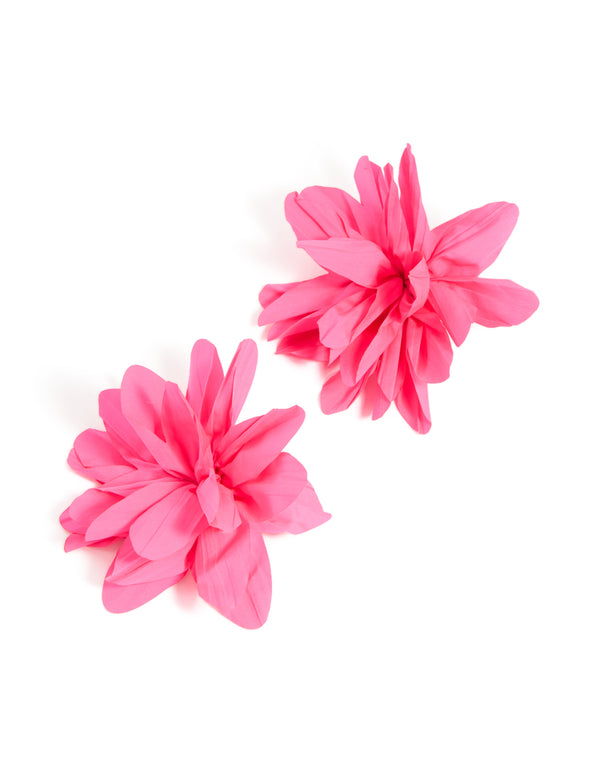 Showcasing statement floral fabric flower petal earrings in gold and pink front view