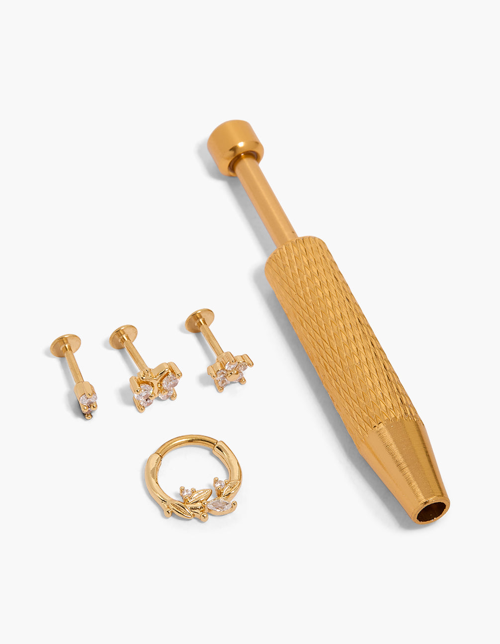 Discover gold plated surgical steel flat back tool and flower vine earrings pack with cubic zirconia stud closure in gold front view