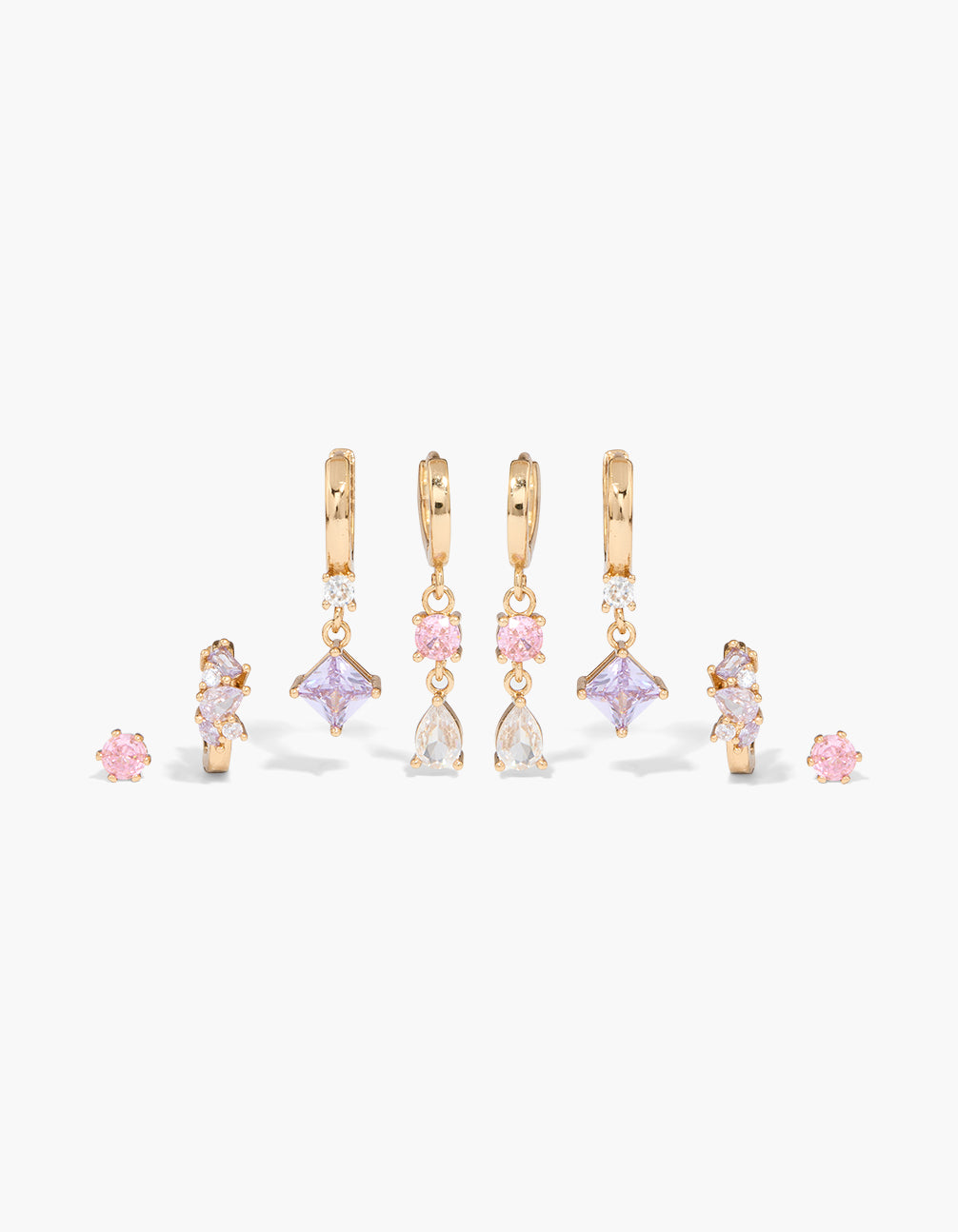 Discover this floral, charm huggie earrings 4-pack featuring cubic zirconia crystal details in gold, pink, and lavender front view