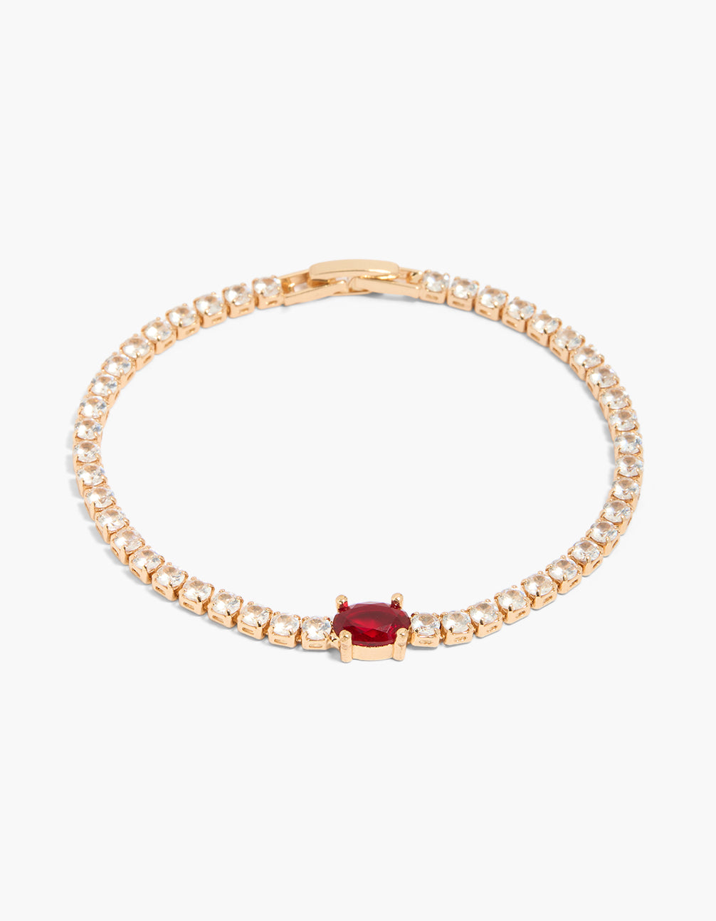 This gold red cubic zirconia classic oval tennis bracelet features crystal details front view