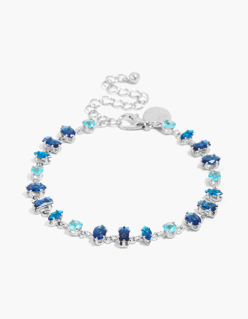 Showcasing a dainty sapphire blue cubic zirconia bracelet in silver front view