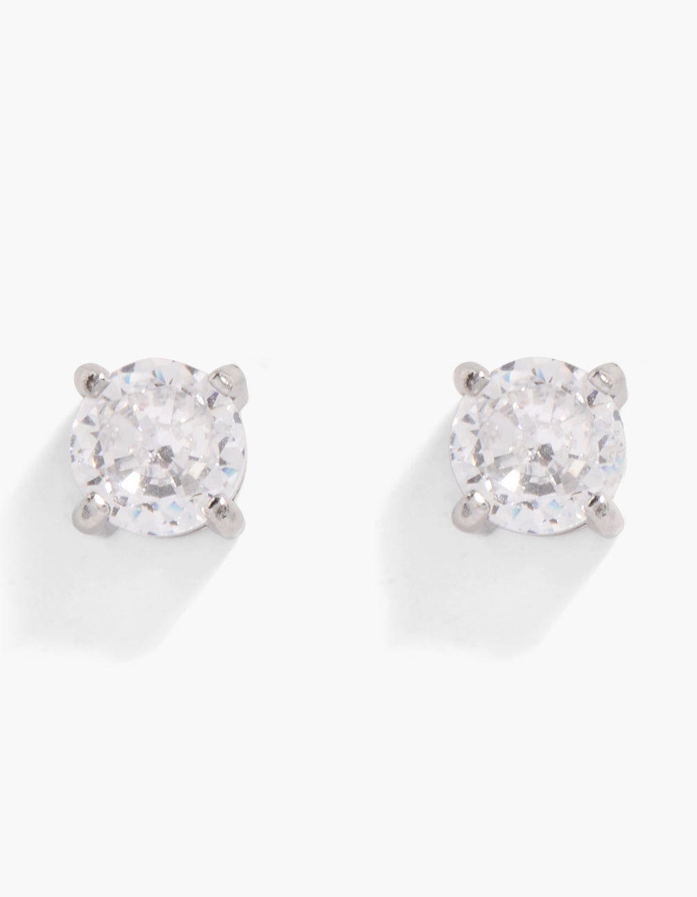 These waterproof stainless steel large round cubic zirconia flat back studs feature crystal detailing in silver and clear front view