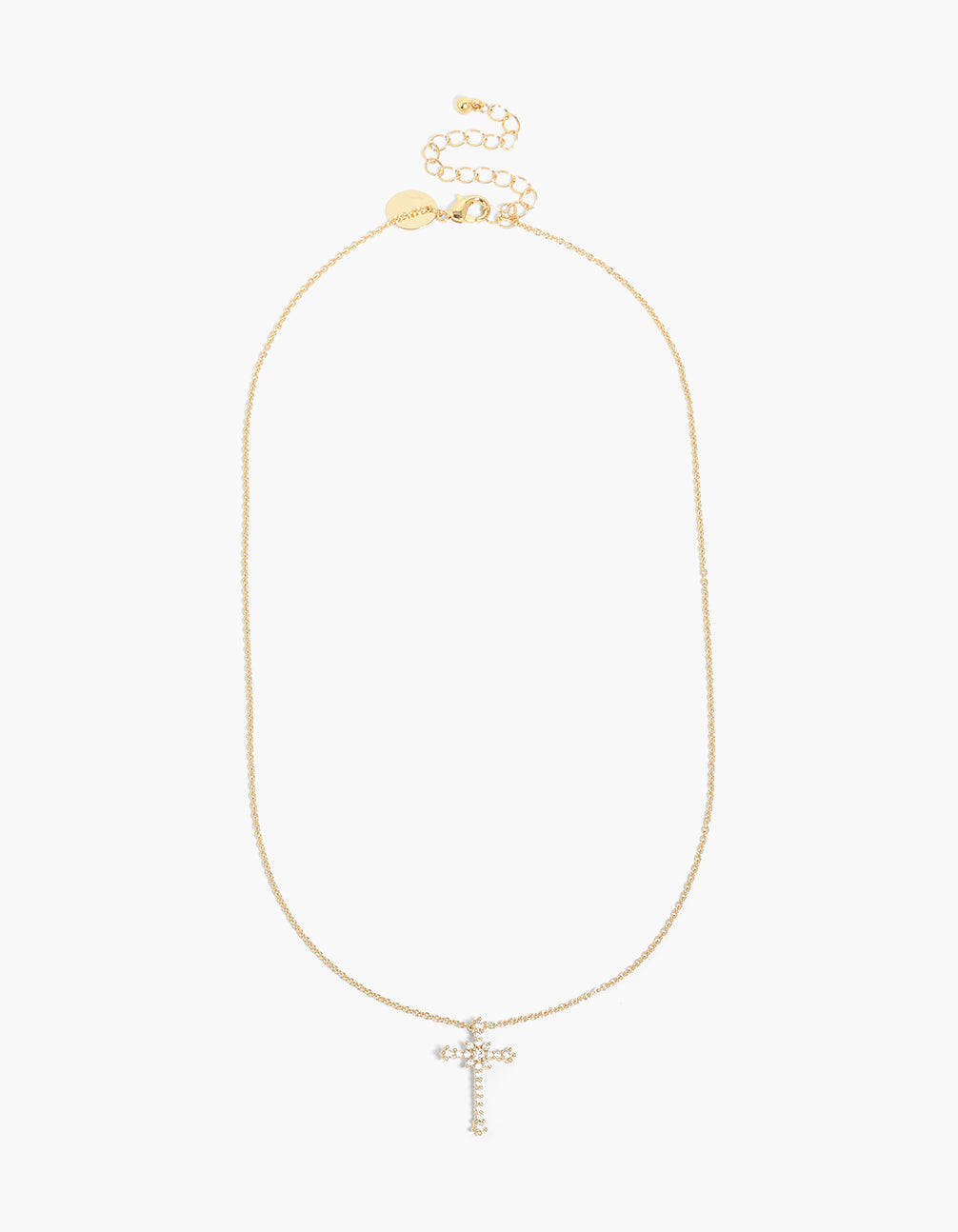 Crafted with cubic zirconia and gold plated detailing, this cross pendant necklace front view